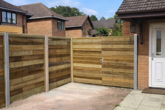 corner-of-wooden-fence-in-backgarden