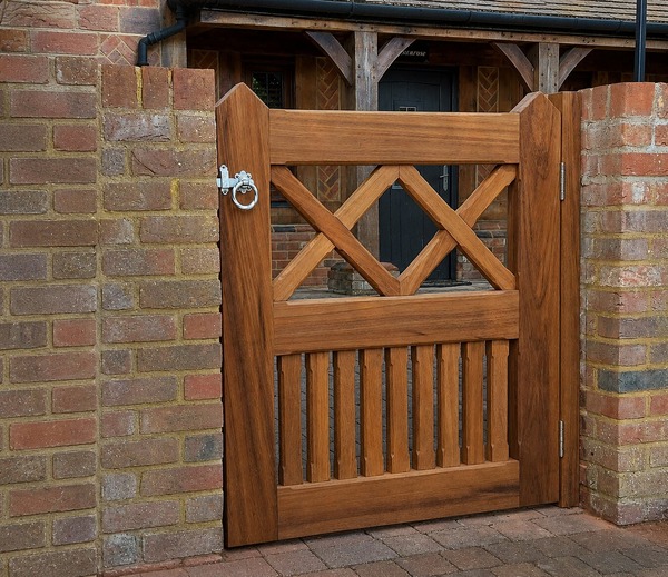 tanned-wooden-front-garden-gate-attached-to-brick-wall